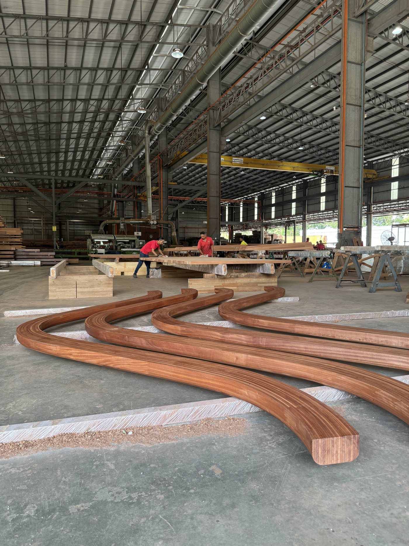 Curved glulam production for resort structures