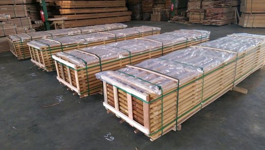 Dekloc panel packs banded for container shipment